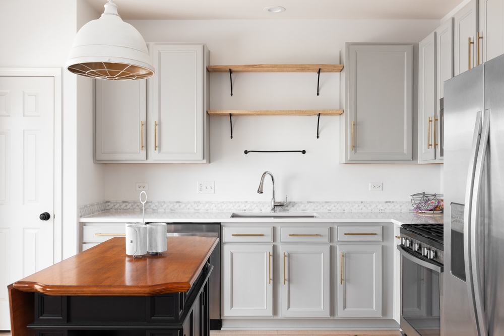 A,Kitchen,Detail,With,Grey,Cabinets,,Stainless,Steel,Appliances,,Marble